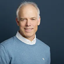 a man in a blue shirt